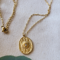 Gold Sunburst Coin Necklace