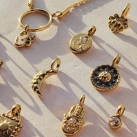 Hammered Sun Coin Charm