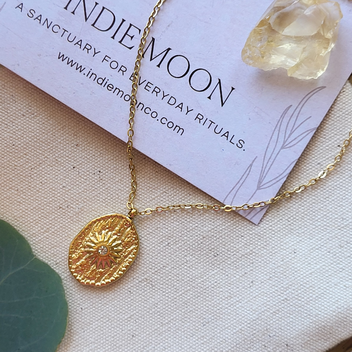 Gold Sunburst Coin Necklace