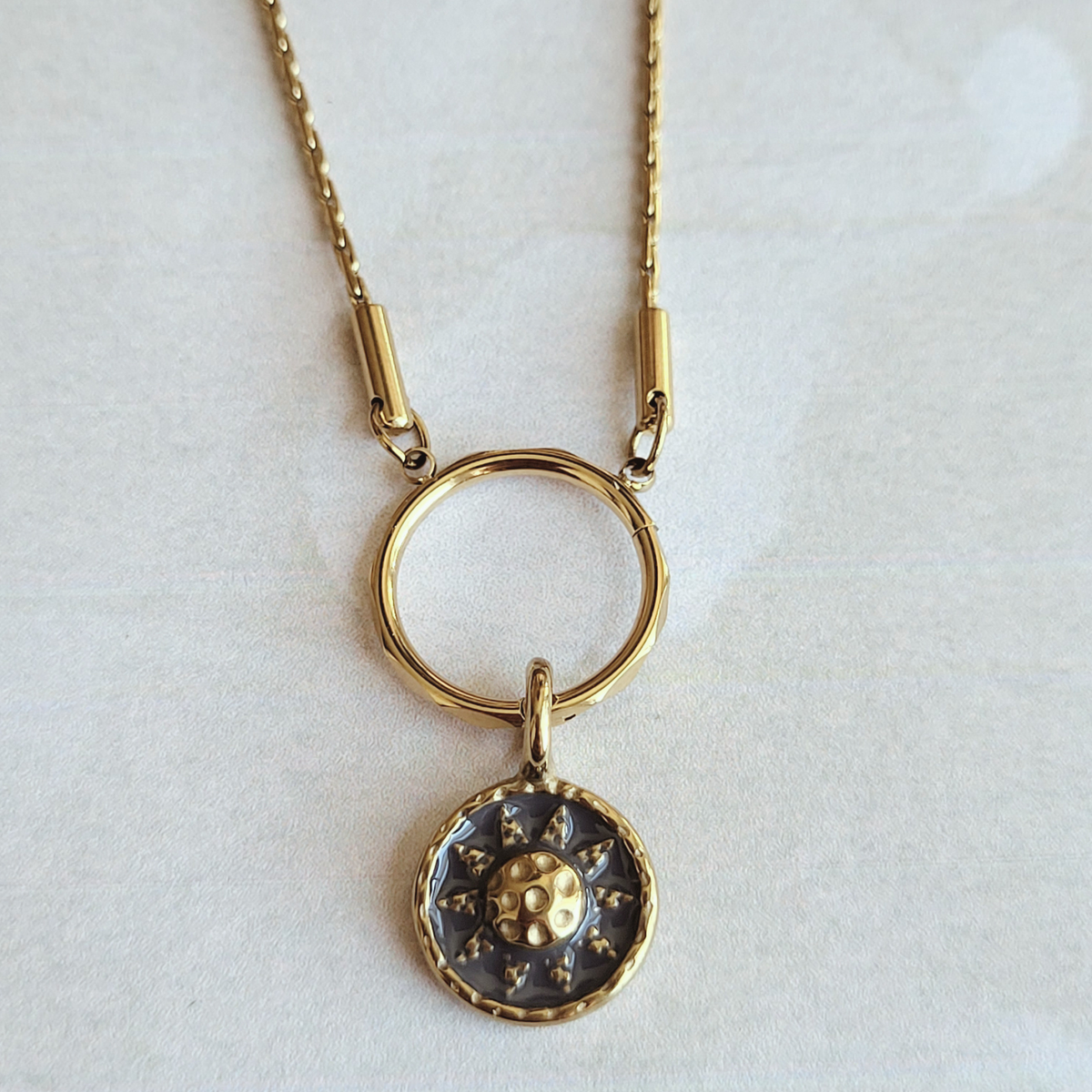 Hammered Sun Coin Charm