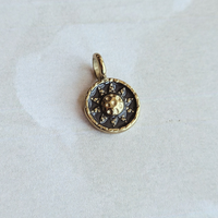 Hammered Sun Coin Charm