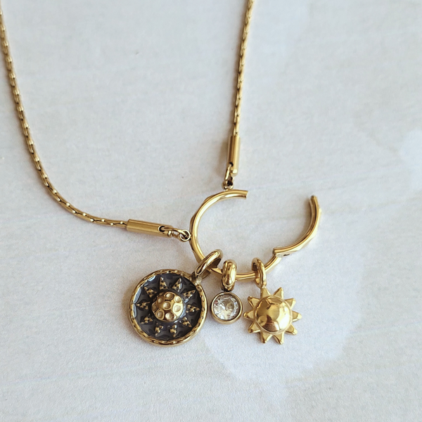 Hammered Sun Coin Charm